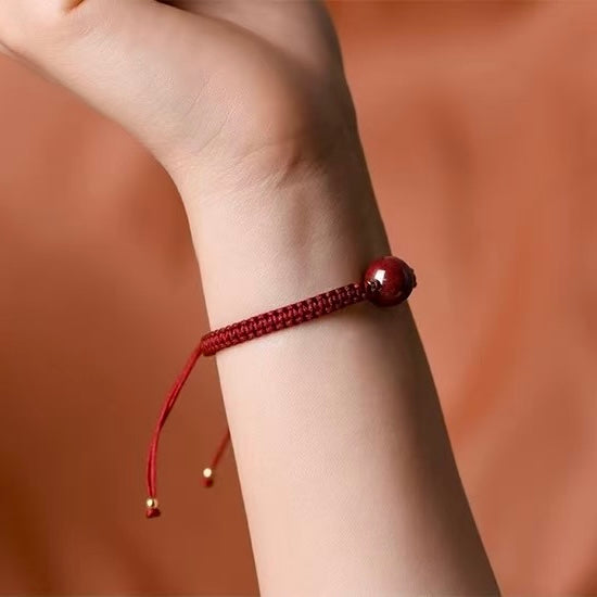 Bracelet cordon rouge avec perle de cinabre